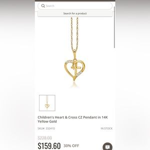 14kgold Pendant w/0.03 ctw diamonds and 14kgold chain set from Riddle’s Jewlery